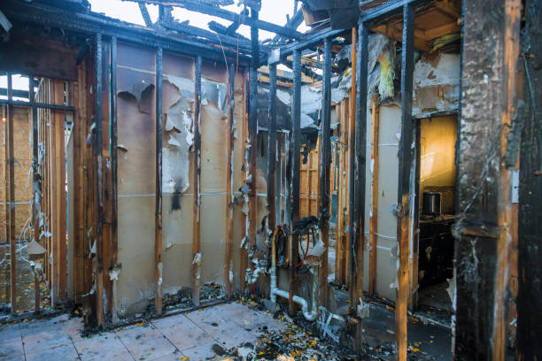 Professional Fire Damage Restoration technician working in Dubuque, IA